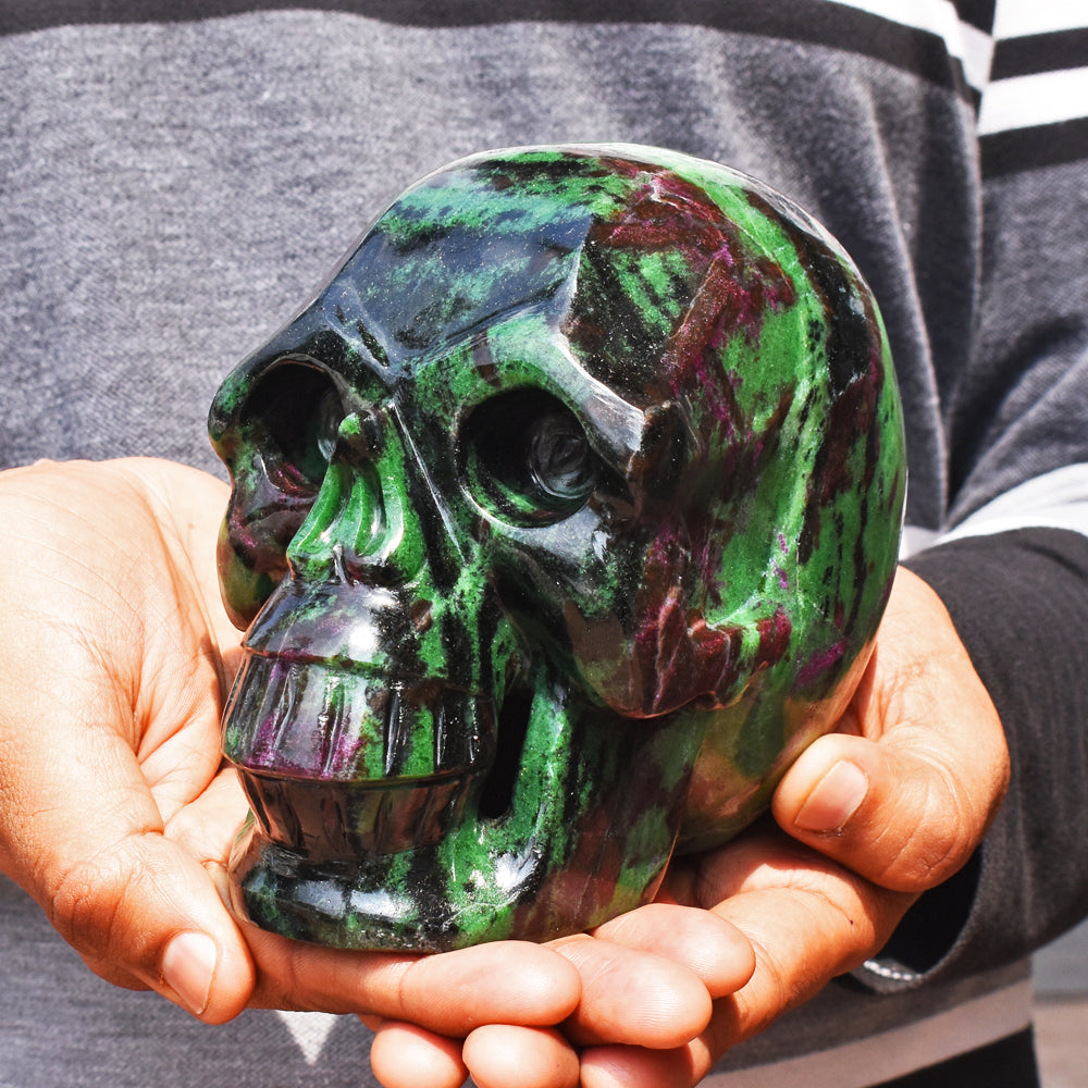 Crafted Enigmas: Unveiling the Mystique of Crystal Ruby Zoisite Skull Carving