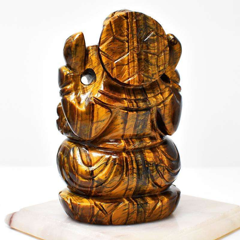 gemsmore:Craftsmen Hand Carved Golden Tiger Eye Lord Ganesha Idol gemsmore:Craftsmen Hand Carved Golden Tiger Eye Lord Ganesha Idol