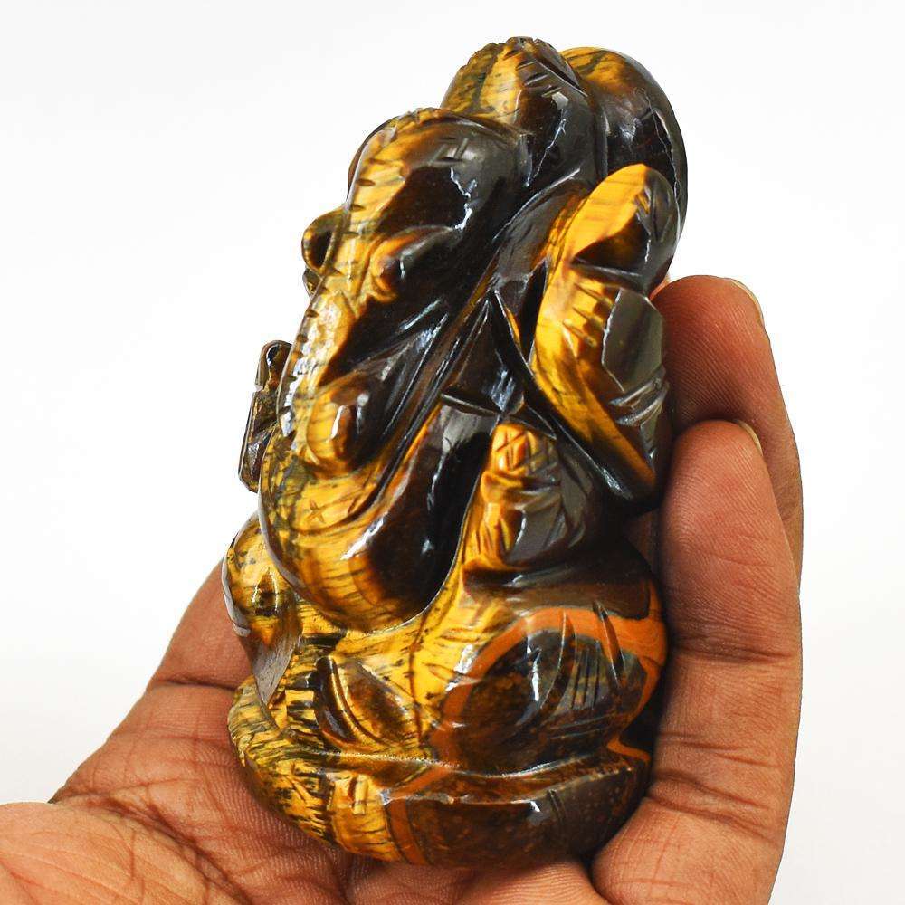gemsmore:Craftsmen Hand Carved Golden Tiger Eye Lord Ganesha Idol gemsmore:Craftsmen Hand Carved Golden Tiger Eye Lord Ganesha Idol