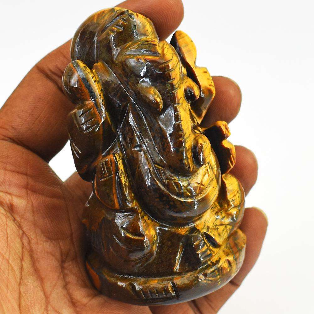 gemsmore:Craftsmen Hand Carved Golden Tiger Eye Lord Ganesha Idol gemsmore:Craftsmen Hand Carved Golden Tiger Eye Lord Ganesha Idol