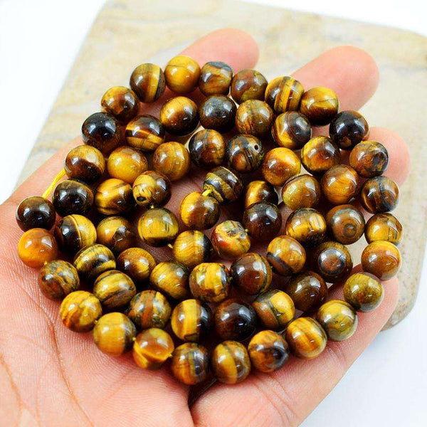 gemsmore:Natural Golden Tiger Eye Round Shape Drilled Beads Strand