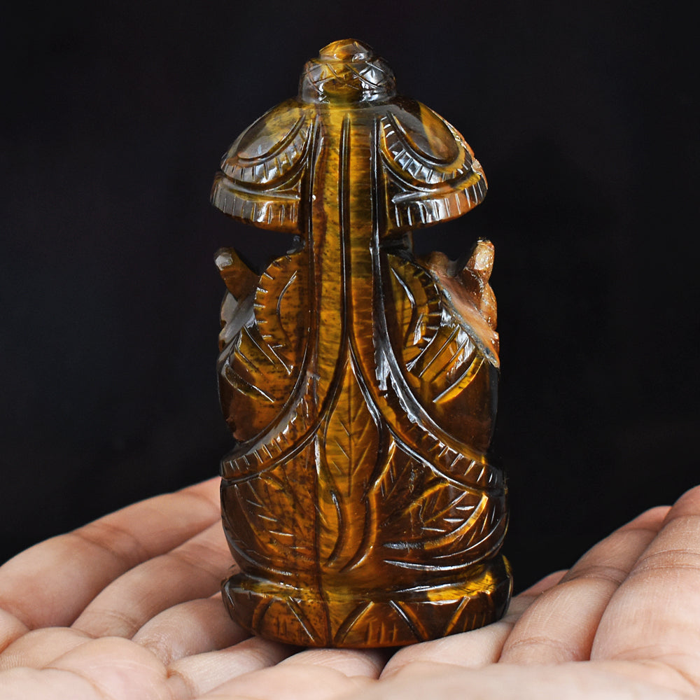 Natural 1186.00 Cts Genuine Golden Tiger Eye Hand Carved Lord Ganesha With Throne Gemstone Carving