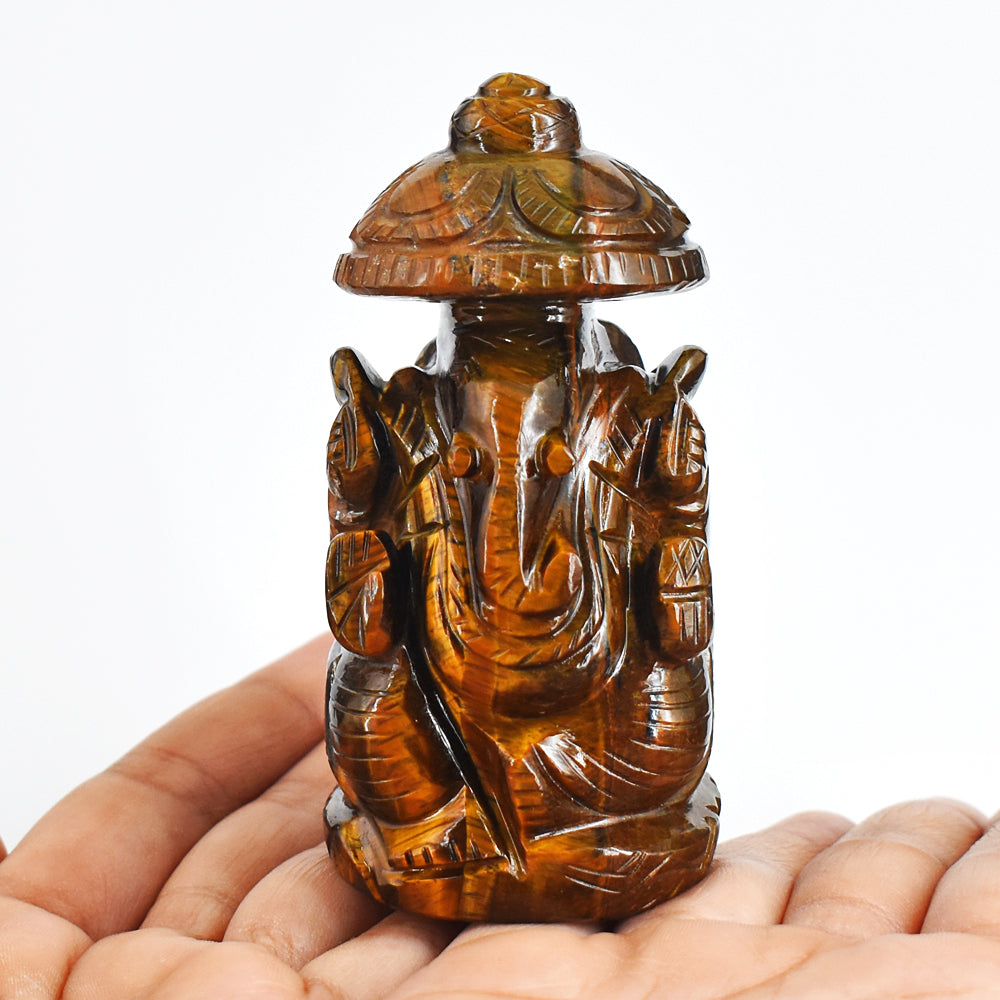 Natural 1186.00 Cts Genuine Golden Tiger Eye Hand Carved Lord Ganesha With Throne Gemstone Carving