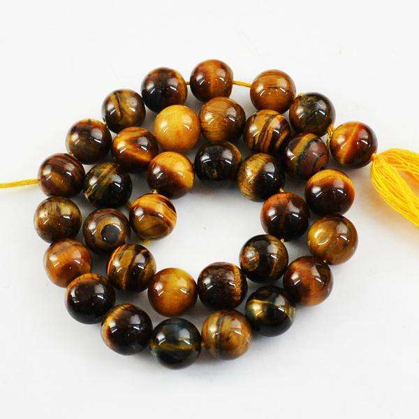 gemsmore:Amazing Natural Round Shape Golden Tiger Eye Drilled Beads Strand.