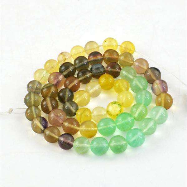 gemsmore:Amazing Natural Round Shape Multicolor Fluorite Drilled Beads Strand