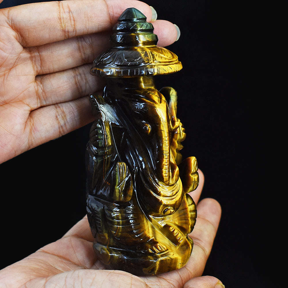 gemsmore:Artisian Hand Carved Golden Tiger Eye Ganesha With Throne
