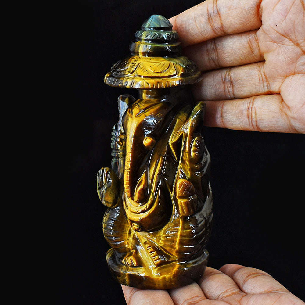 gemsmore:Artisian Hand Carved Golden Tiger Eye Ganesha With Throne