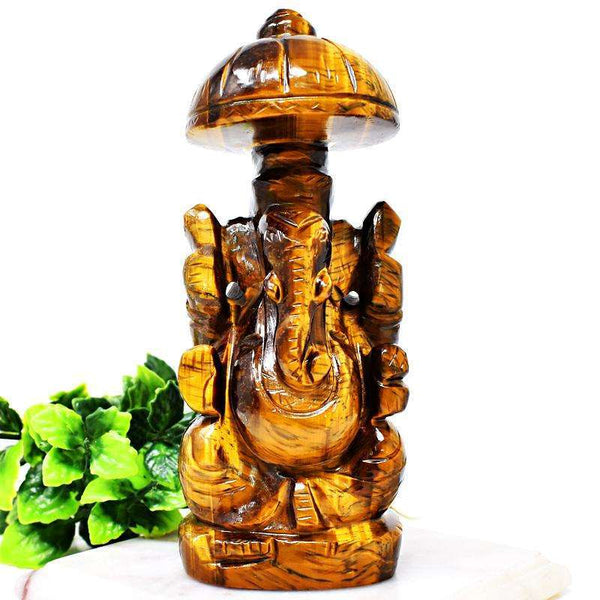 gemsmore:Artisian Hand Carved Golden Tiger Eye Ganesha With Throne