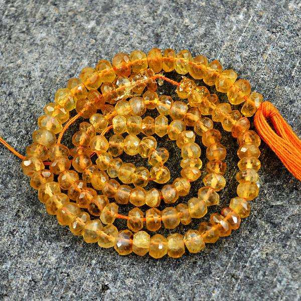 gemsmore:Beautiful Faceted Round Shape Yellow Citrine Drilled Beads Strand