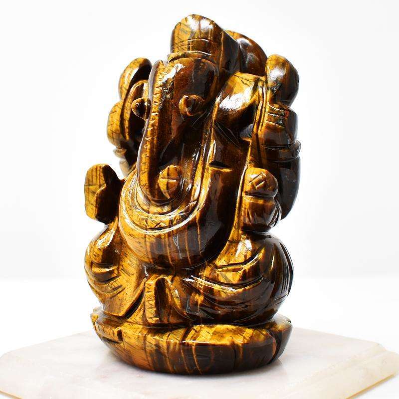 gemsmore:Craftsmen Hand Carved Golden Tiger Eye Lord Ganesha Idol