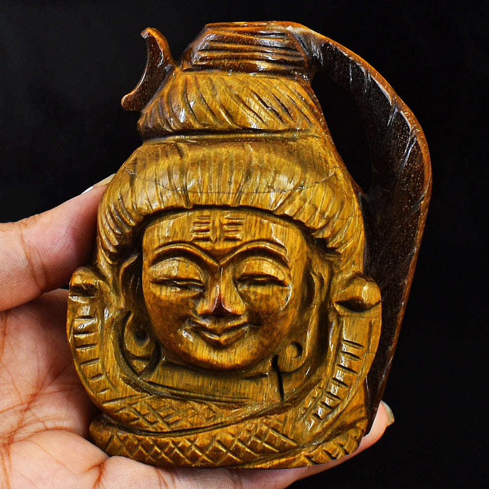 gemsmore:Genuine Hand Carved Tiger Eye  Lord Shiva Head Gemstone