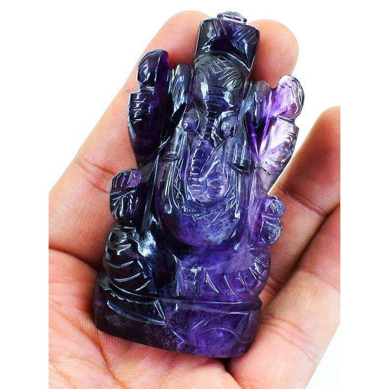 gemsmore:Genuine Purple Fluorite Hand Carved Lord Ganesha Idol