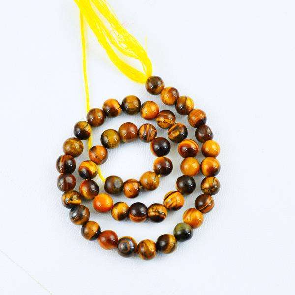 gemsmore:Genuine Round Shape Golden Tiger Eye Drilled Beads Strand