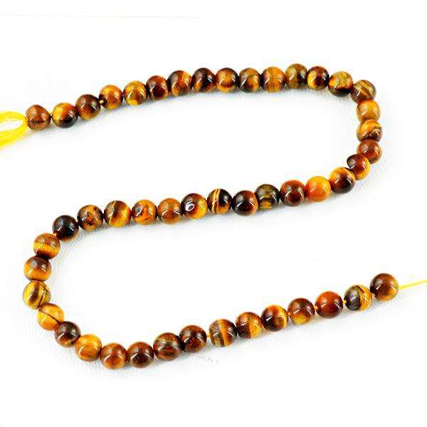 gemsmore:Genuine Round Shape Golden Tiger Eye Drilled Beads Strand
