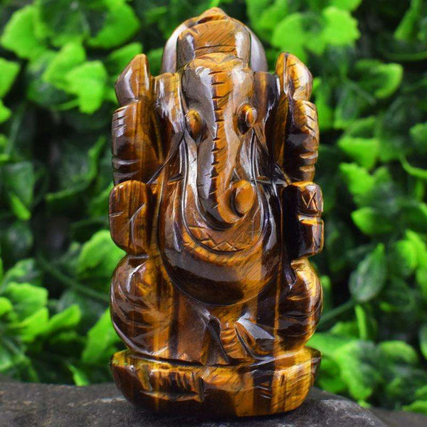 gemsmore:Golden Tiger Eye Hand Carved Lord Ganesha Idol