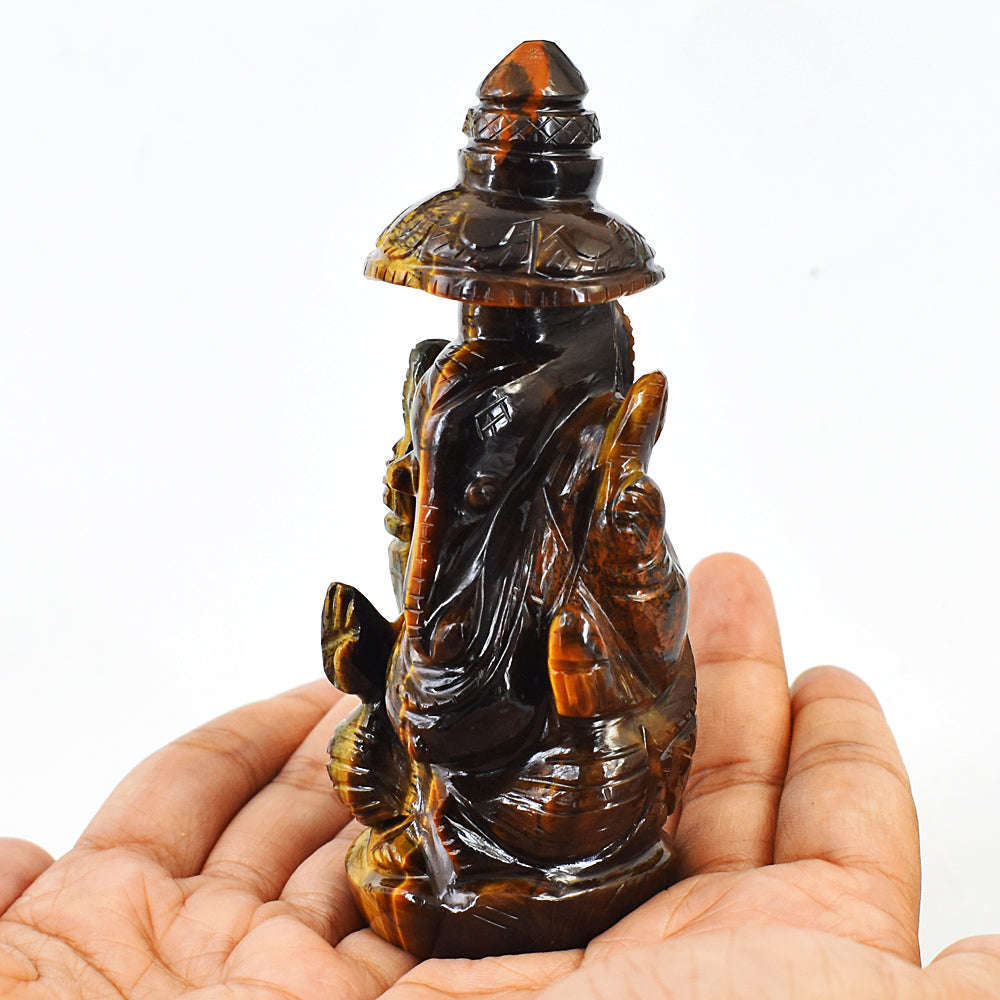 gemsmore:Natural Amazing Artisian Hand Carved Golden Tiger Eye Ganesha With Throne