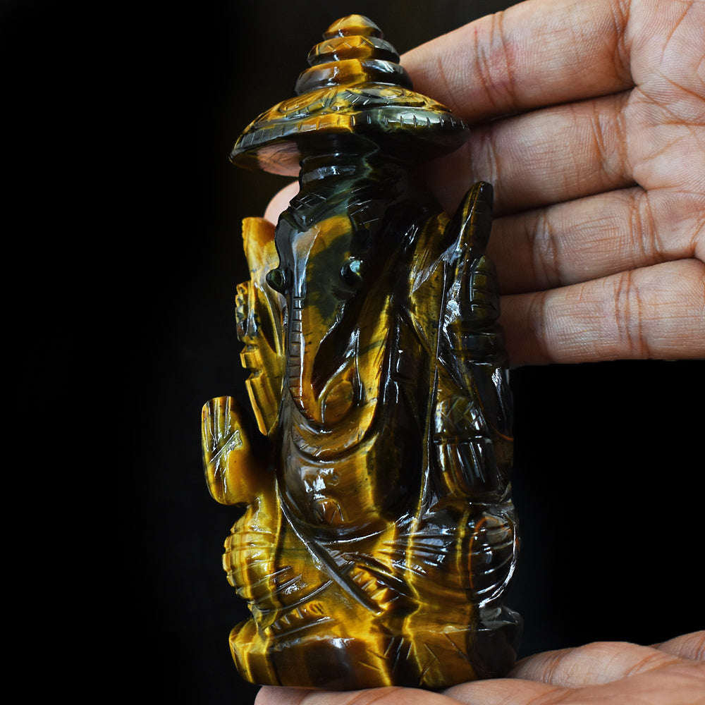 gemsmore:Natural  Amazing Artisian Hand Carved  Tiger Eye Ganesha With Throne