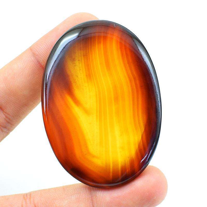 gemsmore:Natural Amazing Oval Shape Onyx Untreated Loose Gemstone