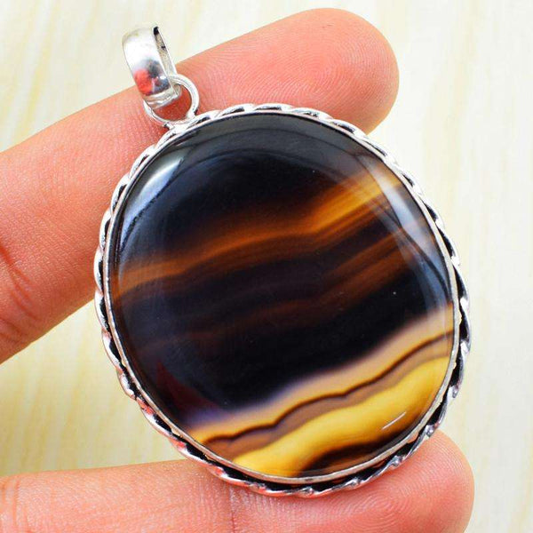 gemsmore:Natural Black Onyx Oval Shape Tibet Silver Pendant