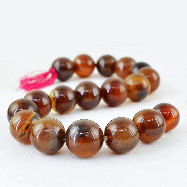 gemsmore:Natural Drilled Brown Onyx Round Shape Beads Strand