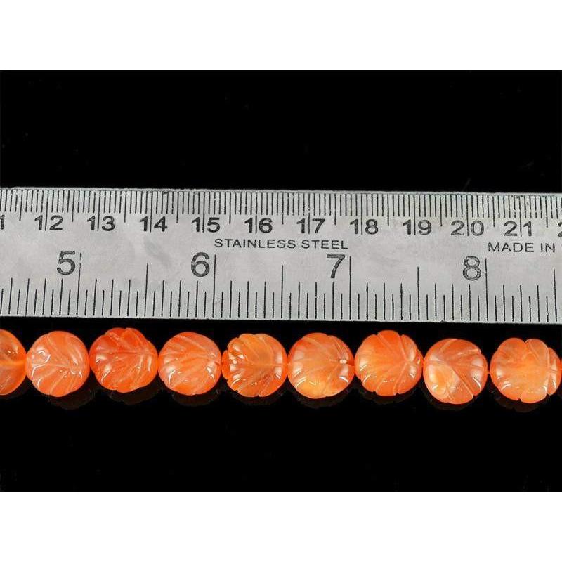 gemsmore:Natural Drilled Orange Carnelian Carved Beads Strand