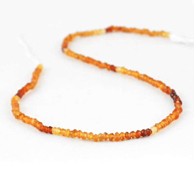 gemsmore:Natural Faceted Hessonite Garnet Beads Strand - Round Shape