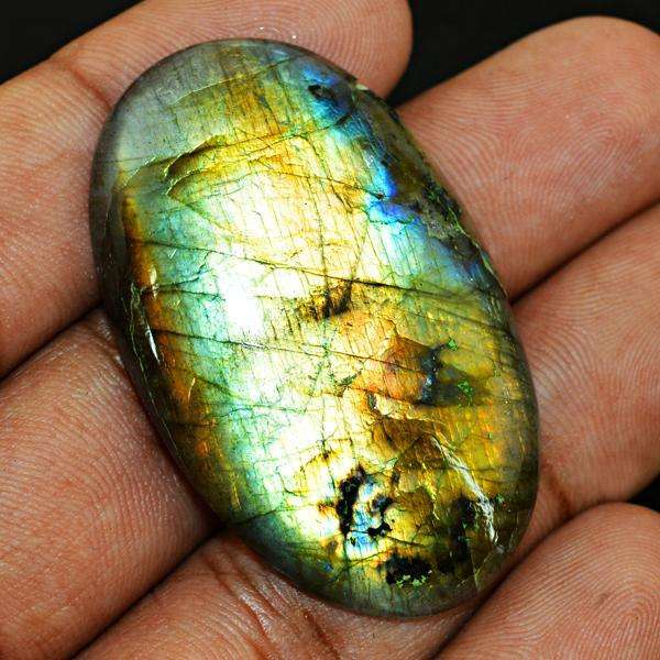 gemsmore:Natural Golden & Blue Flash Labradorite Oval Shape Loose Gemstone