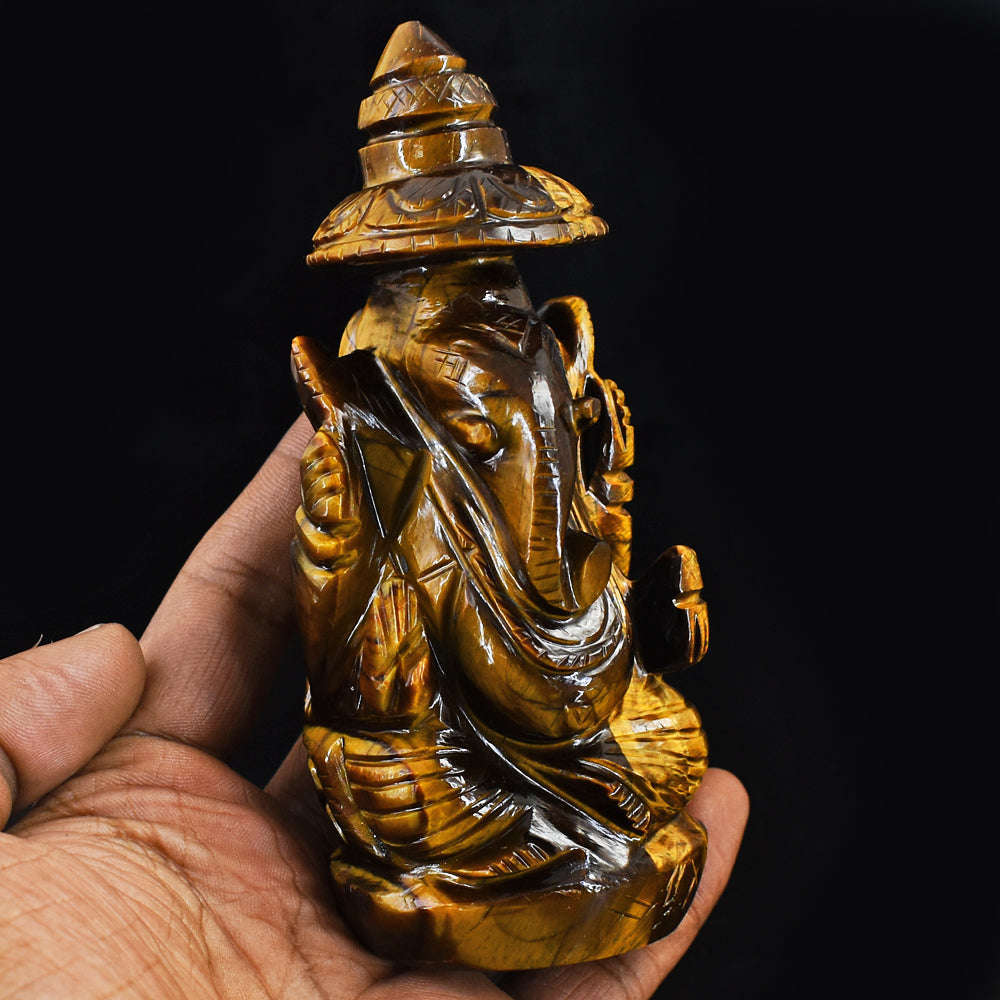 gemsmore:Natural Hand Carved Golden Tiger Eye Ganesha With Throne