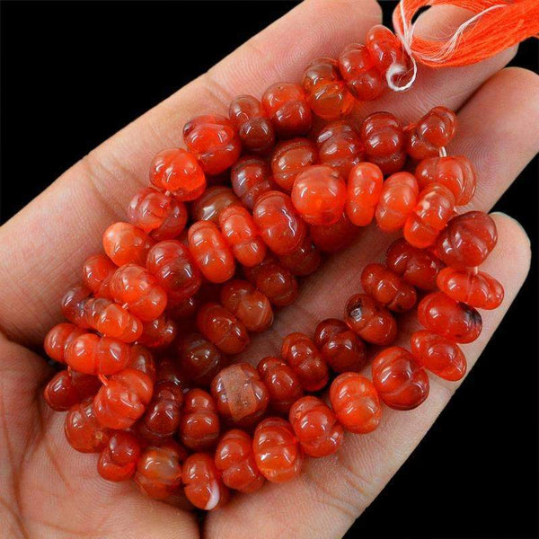 gemsmore:Natural Orange Carnelian Carved Beads Strand Drilled Round Shape