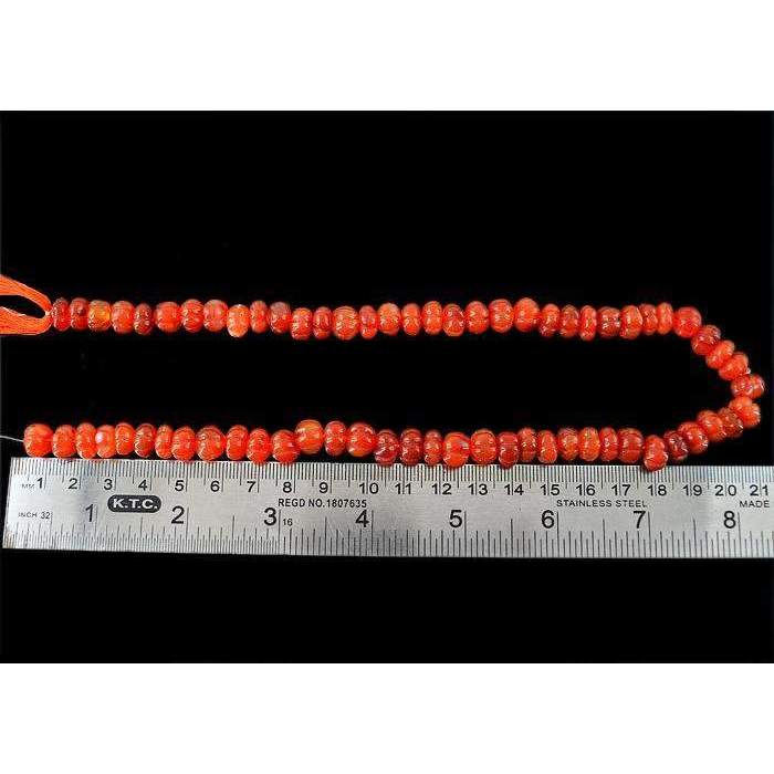 gemsmore:Natural Orange Carnelian Carved Beads Strand Drilled Round Shape