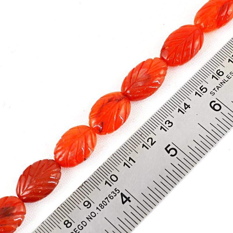 gemsmore:Natural Orange Carnelian Oval Carved Beads Strand