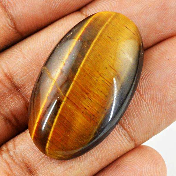 gemsmore:Natural Tiger Eye Oval Shape Untrerated Loose Gemstone