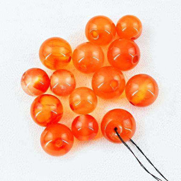 gemsmore:Natural Untreated Orange Onyx Round Drilled Beads Lot