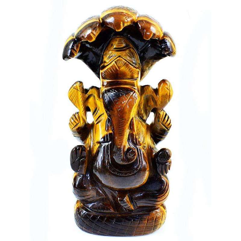 gemsmore:Premium Golden Tiger Eye Lord Ganesha Carved Idol With Snake At Back