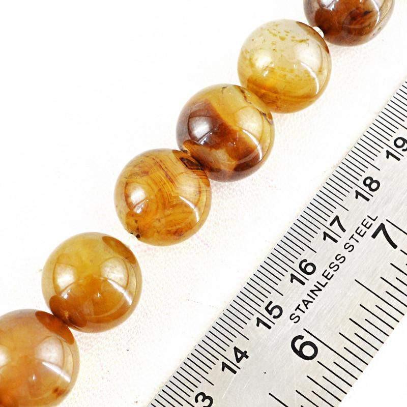 gemsmore:Round Shape Brown Onyx Strand Natural Untreated Drilled Beads