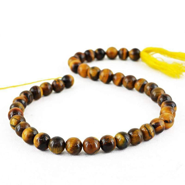 gemsmore:Round Shape Golden Tiger Eye Strand Natural Untreated Drilled Beads