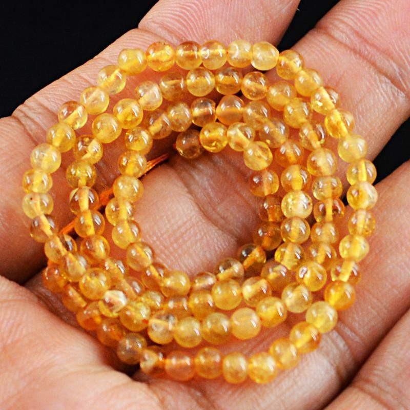gemsmore:Round Shape Yellow Citrine Strand Natural Untreated Drilled Beads