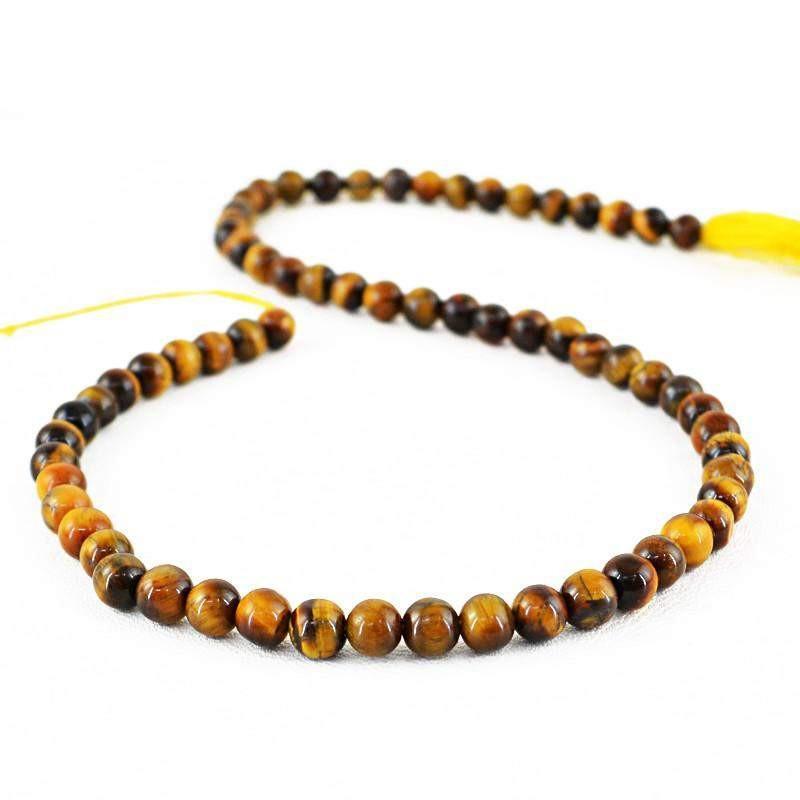 gemsmore:Untreated Golden Tiger Eye Strand Natural Round Shape Beads