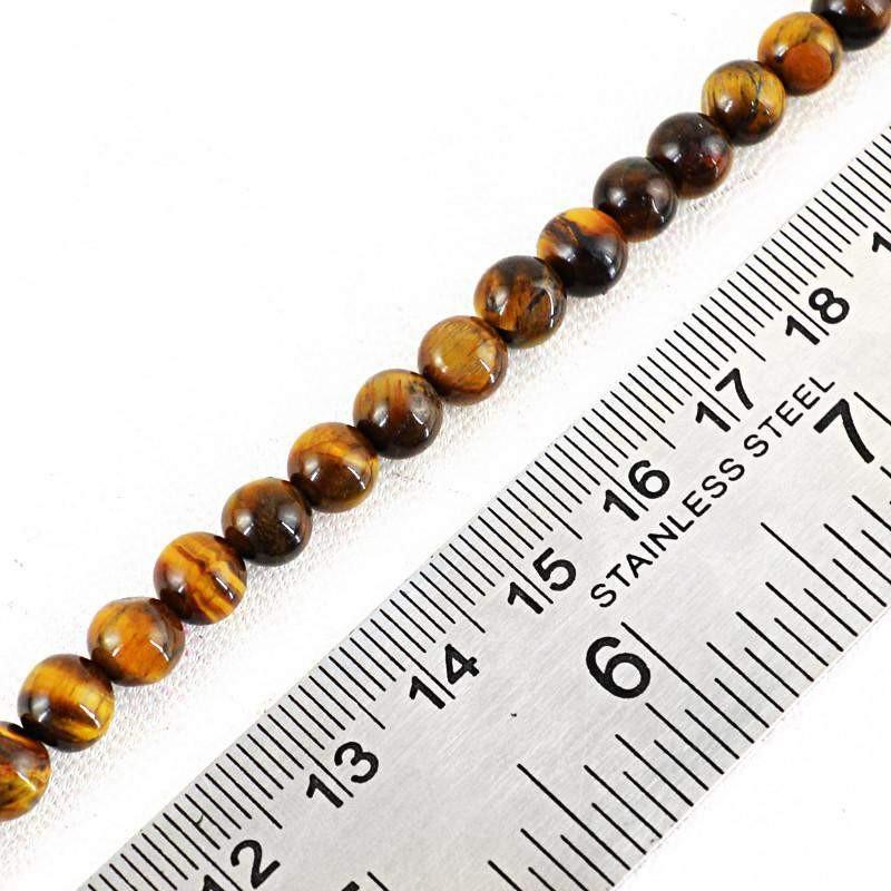 gemsmore:Untreated Golden Tiger Eye Strand Natural Round Shape Beads