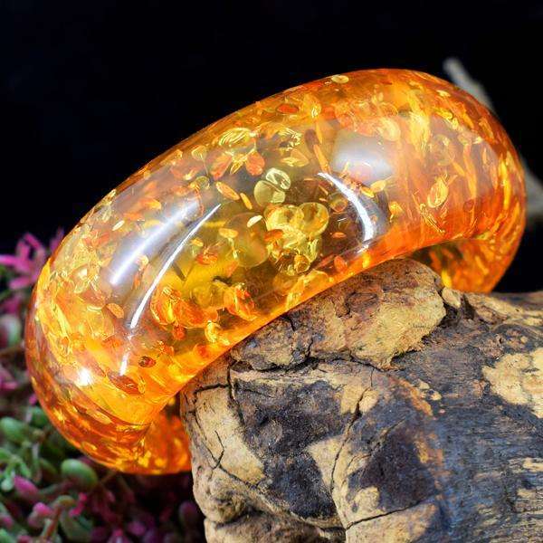 gemsmore:Women Jewellery Synthetic Amber Carved Bangle